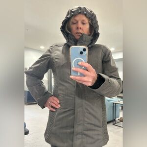 Size 8 ski jacket in gray. Barely worn. High quality with all bells and whistles